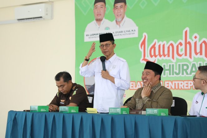 
					Keterangan Foto: Wali Kota Batam, Amsakar Achmad, saat melakukan sambutan dalam peringatan Milad ke-50 Majelis Ulama Indonesia (MUI) tingkat Kota Batam, (Diskominfo Batam).