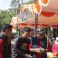 Memakai Topi, Walikota Tanjungpinang, H Lis Darmansyah saat berbelanja di Stand HPN 2026 yang digelar PWI Kota Tanjungpinang, Minggu (08/02) F-PWI Kota Tanjungpinang