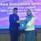 Gubernur Kepri Ansar Ahmad menyerahkan penyampaian Laporan Keuangan Unaudited Pemerintah Provinsi Kepualaun Riau Tahun Anggaran 2025, bertempat di Kantor BPK Batam Centre, Senin (30/3). F-Kominfo Kepri