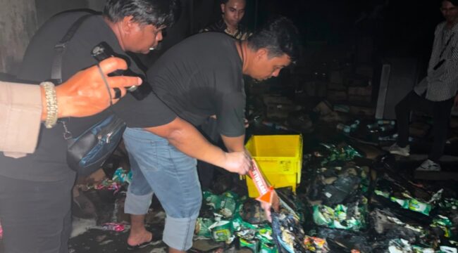 Anggota Kepolisian melakukan oleh TKP